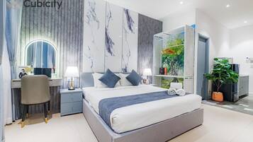 Deluxe Studio, City View | Premium bedding, in-room safe, individually decorated