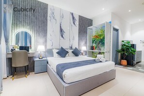 Deluxe Studio, City View | Premium bedding, in-room safe, individually decorated