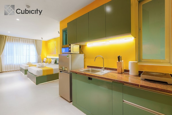 Standard Twin Room, City View | In-room safe, desk, laptop workspace, blackout drapes