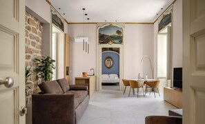 Luxury Quadruple Room, Balcony, City View | Living area | LED TV
