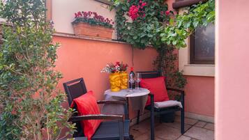 Quadruple Room, Balcony | Outdoor dining