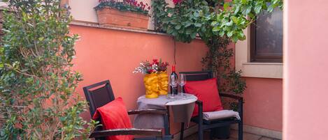 Quadruple Room, Balcony | Outdoor dining