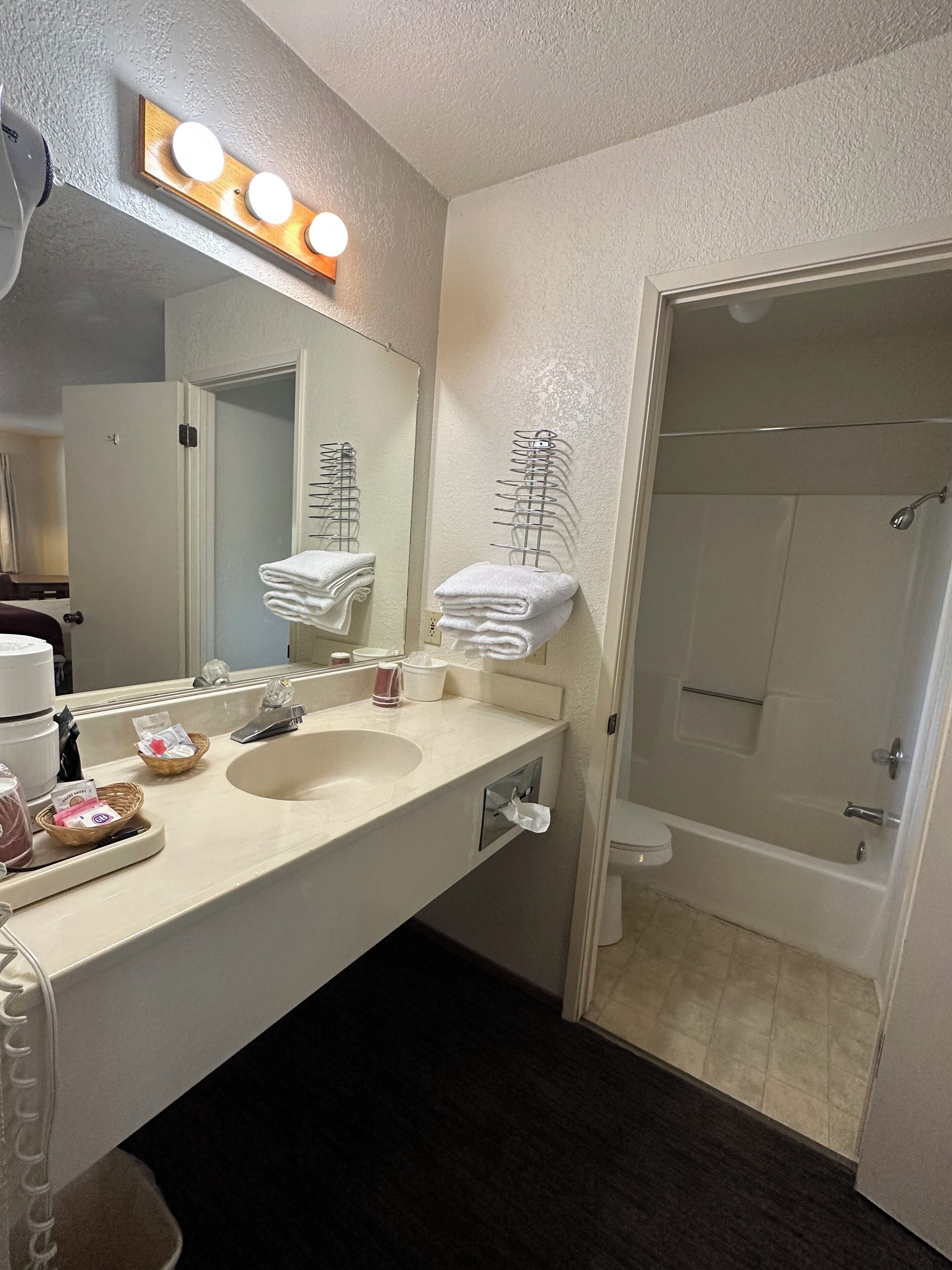 Hair dryer, towels, soap, shampoo