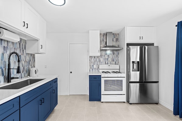 Microwave, stovetop, coffee/tea maker, toaster