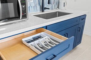 Microwave, stovetop, coffee/tea maker, toaster