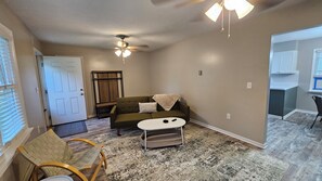 Living area - Quaint Rennovated 2-Bedroom close to the solar farms and Honda (Raymond)