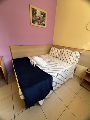 Desk, laptop workspace, free WiFi, bed sheets