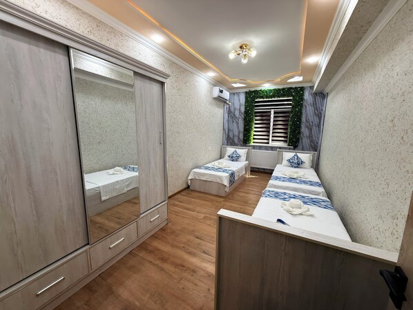 2 habitaciones, acceso a internet y ropa de cama 