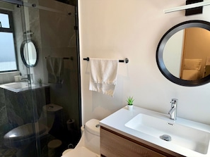 Shower, hair dryer, towels, soap
