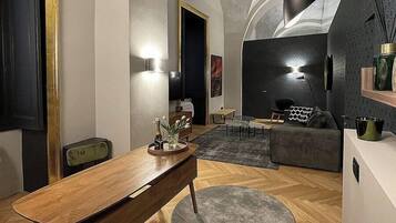 Basic Apartment | Living area | 55-inch Smart TV with digital channels, Netflix, streaming services