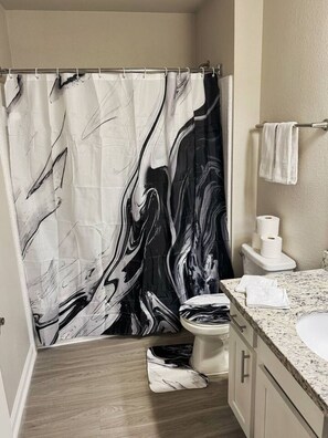 Hair dryer, towels, soap, shampoo