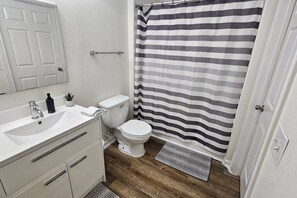 Hair dryer, towels, soap, toilet paper