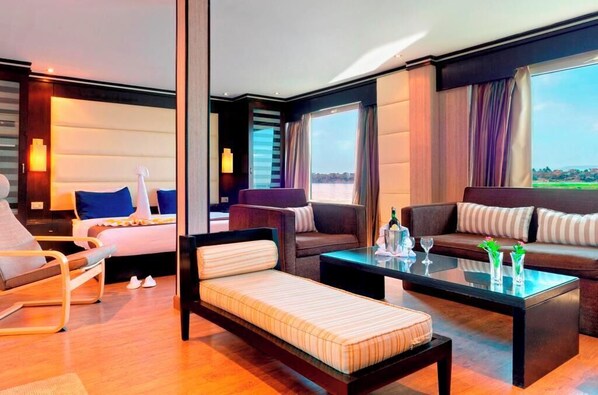 Deluxe Suite, River View | In-room safe, blackout drapes, soundproofing