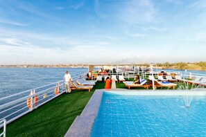 Outdoor pool, pool umbrellas, sun loungers - Nile Cruise Voyager every Friday from Aswan 3 nights and every Monday from Luxor 4 nights (Aswan)
