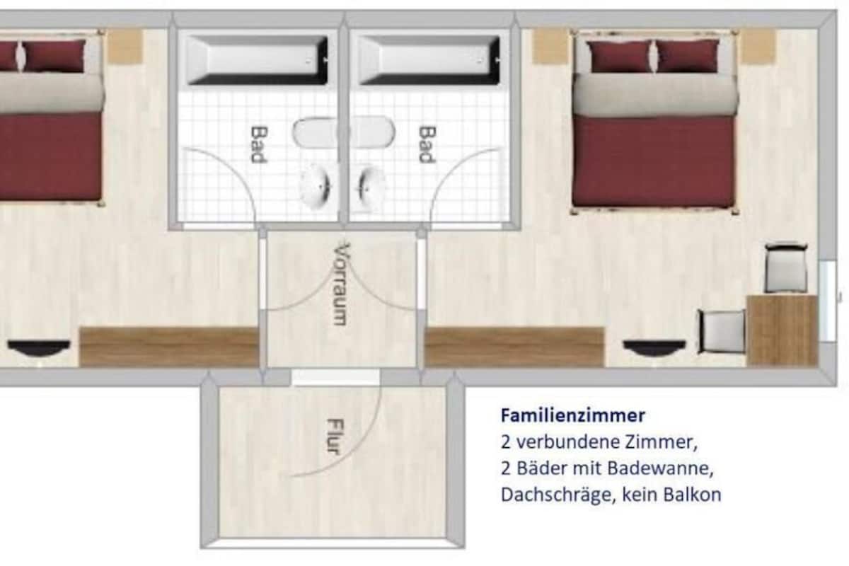 Ein Familienzimmer mit zwei Schlafzimmern, zwei Bädern und einem Wohnbereich.
