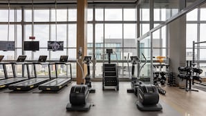 A gym with treadmills, a stair climber, and weight machines. - Apt w/ Balcony & View, 280m From the Metro Hbw2317 (São Paulo)