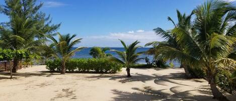 On the beach, sun-loungers, beach towels