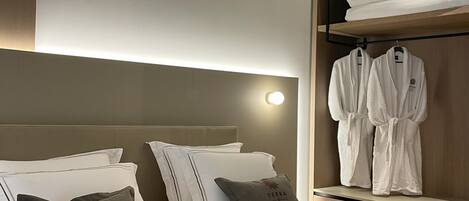 Premium bedding, memory-foam beds, minibar, in-room safe