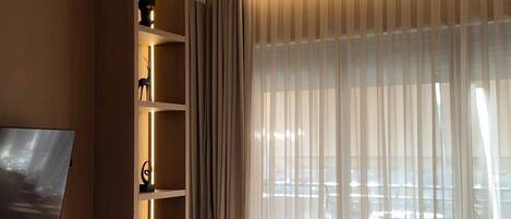 Premium bedding, memory-foam beds, minibar, in-room safe