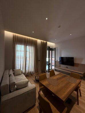 Family Apartment | Living area | 123-cm Smart TV with digital channels