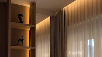 Premium bedding, memory-foam beds, minibar, in-room safe