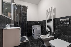 Shower, eco-friendly toiletries, hair dryer, bidet