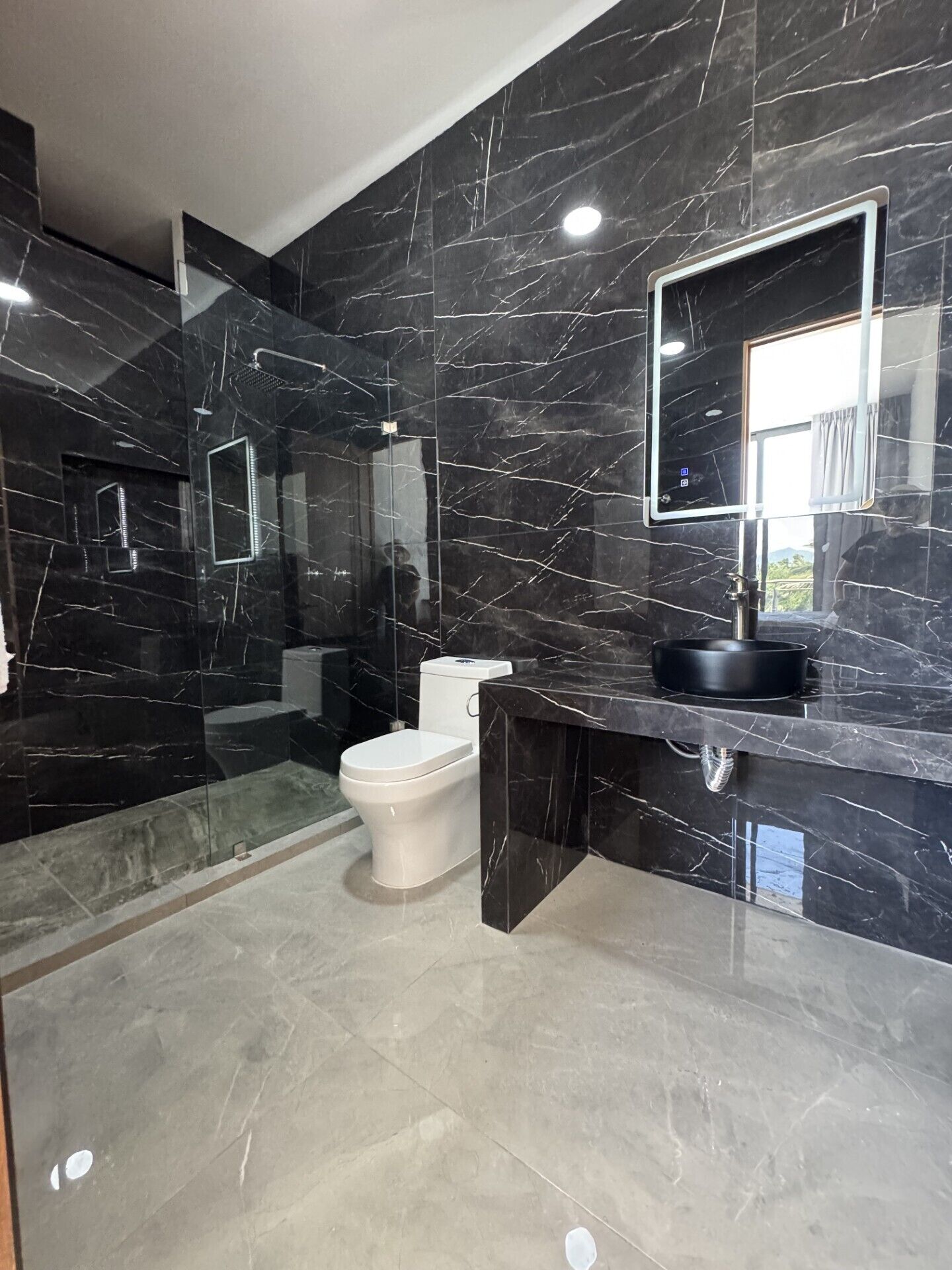 Shower, towels, toilet paper