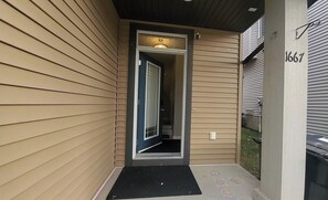 Exterior detail - 4K Projector Theatre, Cozy Vibes, Attached Garage, 2 King, 1 Queen, 1 sofa bed (Edmonton)