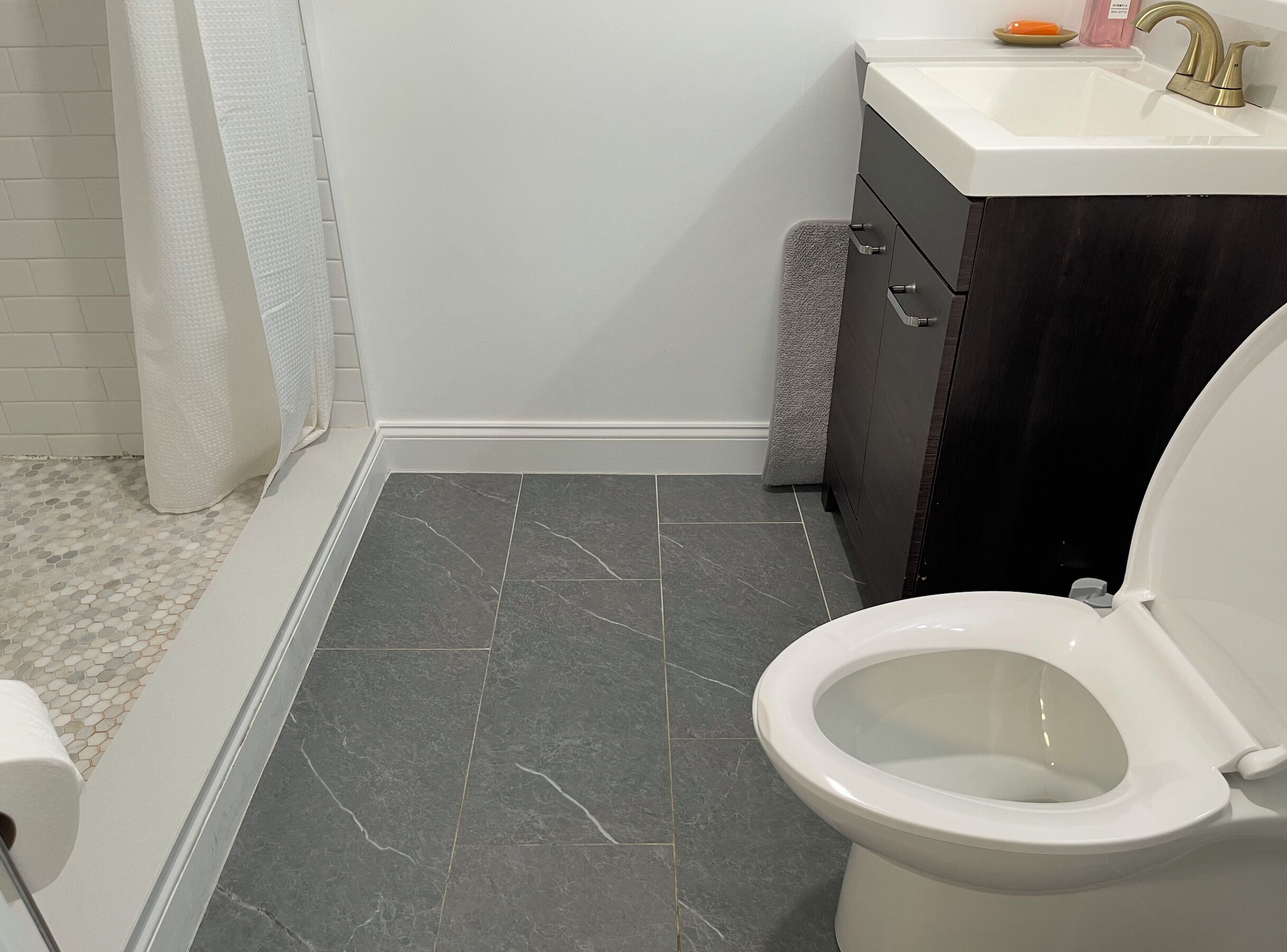 Shower, towels, soap, toilet paper