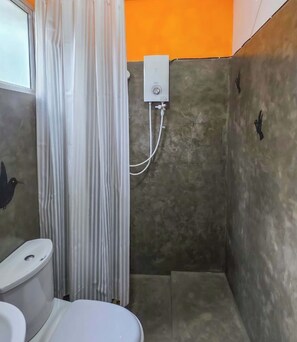 Family Twin Room | Bathroom | Shower, slippers, towels, soap