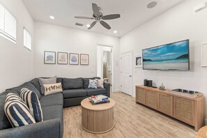 House, Multiple Beds, Patio, Garden View (The Flamingo Nest) | Living area | 42-inch flat-screen TV with digital channels