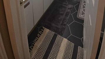 Bidet, towels, soap, toilet paper