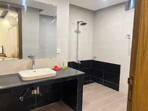 Shower, towels, soap, toilet paper