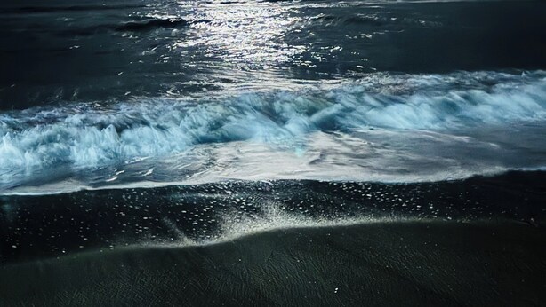 A beach with waves and a cloudy sky. - “AH!” It's time to relax at the beach! (Avon)