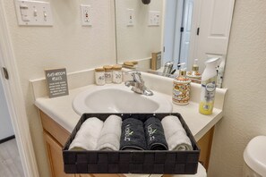 Hair dryer, towels, soap, shampoo