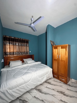 Chambre Deluxe, 2 lits doubles | Bureau, fer et planche Ă repasser, Wi-Fi gratuit, draps fournis