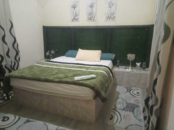 Premium bedding, memory foam beds, desk, laptop workspace