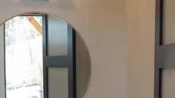 Shower, hair dryer, towels, shampoo