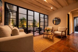 Superior Apartment, 2 Bedrooms, Kitchen | Living area | 55-inch Smart TV with digital channels, Netflix, streaming services - Paseo del Centro, Boutique Condos, Centro Histórico (San Miguel de Allende)