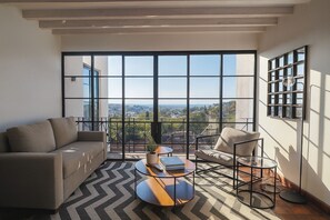 Design Apartment | Living area | 55-inch Smart TV with digital channels, Netflix, streaming services - Luxury condos I Parroquia View & Rooftop Jacuzzi I Paseo del Centro Condominio Boutique (San Miguel de Allende)