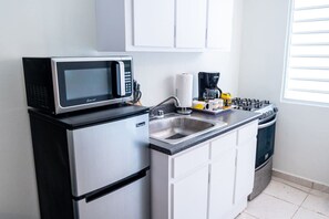 Microwave, oven, stovetop, coffee/tea maker