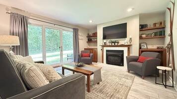 Smart TV, fireplace, books