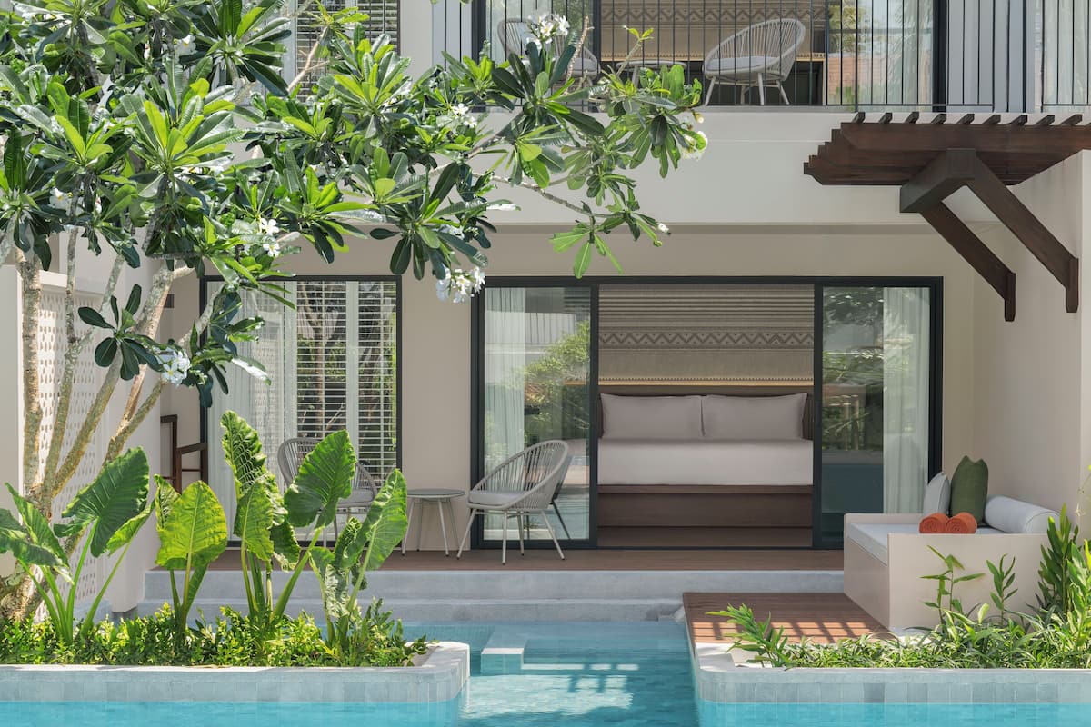 Deluxe Room, 1 King Bed, Pool Access | Pillowtop beds, minibar, in-room safe, desk