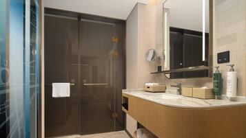 Comfort Room, 1 King Bed | Bathroom | Designer toiletries, hair dryer, slippers, towels