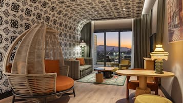 Junior Suite, 1 King Bed, Terrace | Living area | 55-inch LED TV with digital channels