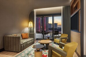 Suite Deluxe, 1 habitación, terraza | Zona de estar | Televisión LED de 55 pulgadas con canales digitales