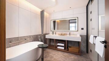 Deluxe Suite, 1 King Bed, River View | Bathroom | Slippers