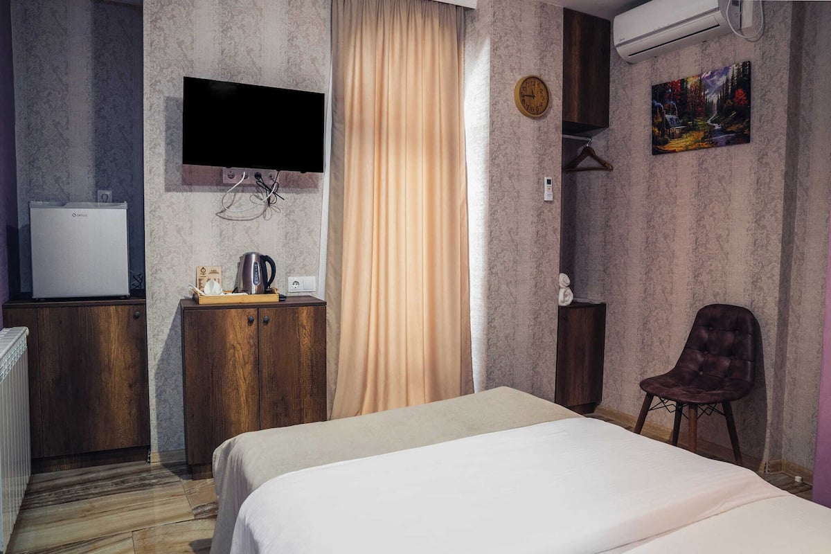 Basic Double Room, Balcony, Courtyard View | Blackout drapes, iron/ironing board, free WiFi, bed sheets