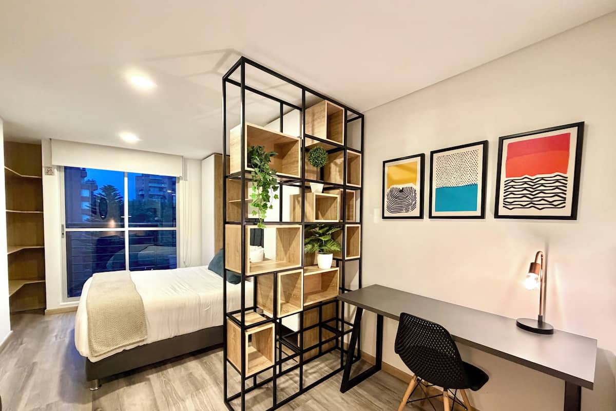 Departamento Deluxe | Caja de seguridad en la habitación y tabla de planchar con plancha