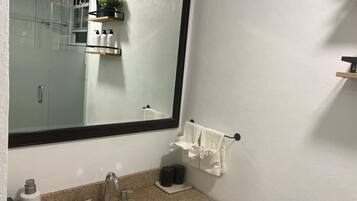 Hair dryer, towels, soap, toilet paper